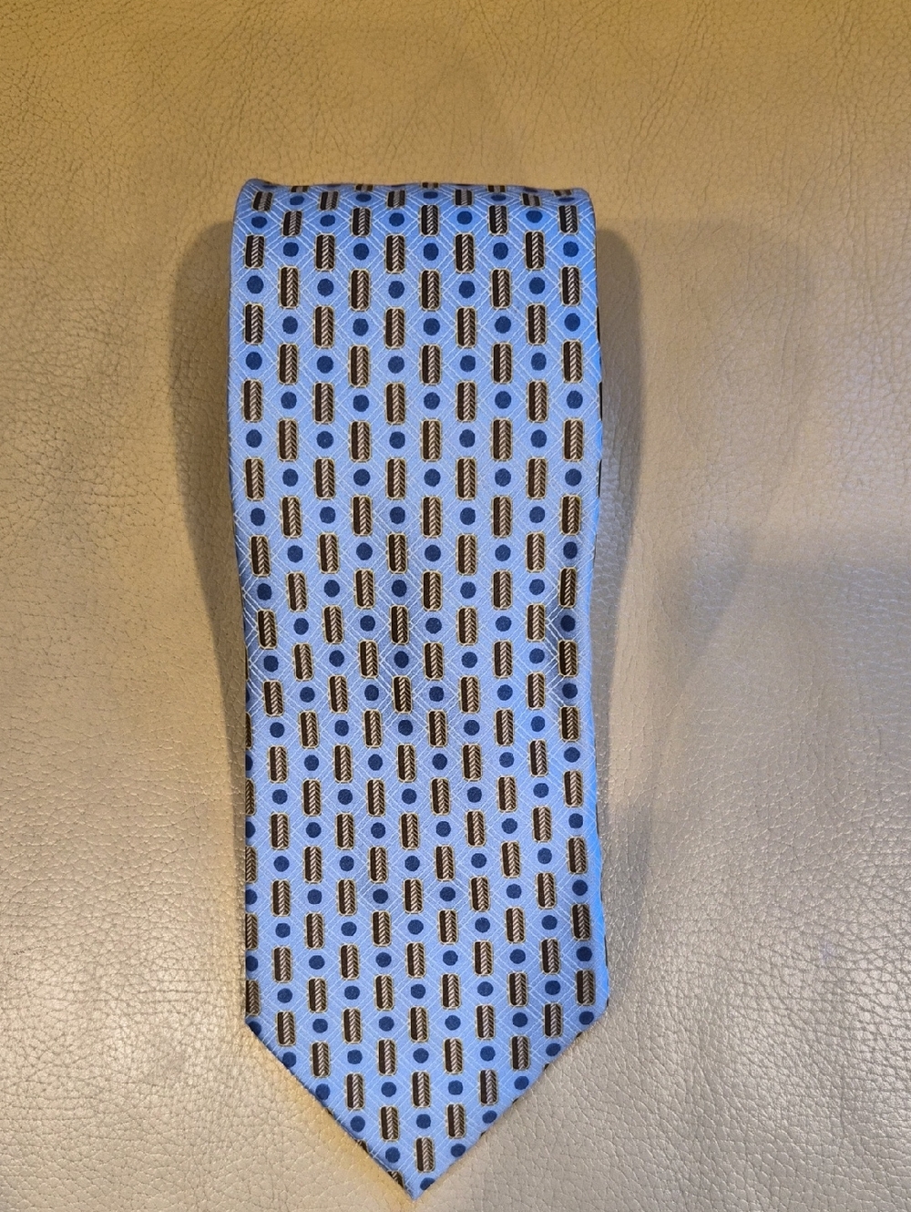 Authentic Ermenegildo Zegna  Blue Silk Tie with Brown and Navy Geometric Motif.